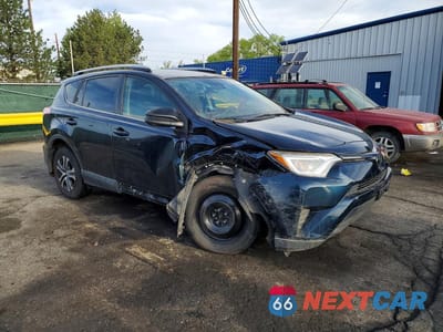 Czwarte zdjęcie samochodu z boku: 2018 TOYOTA RAV4 LE VIN:JTMBFREV3JJ255320 - miniatura