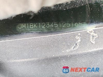 Zdjęcie 12 z 12 samochodu: 2005 MAZDA 3 S VIN:JM1BK123451251654 - miniatura