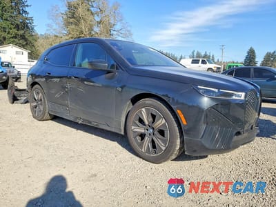 Czwarte zdjęcie samochodu z boku: 2022 BMW IX XDRIVE50 VIN:WB523CF03NCK69247 - miniatura