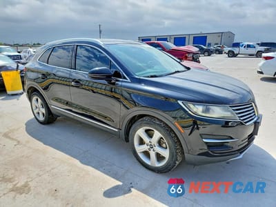 Czwarte zdjęcie samochodu z boku: 2016 LINCOLN MKC PREMIERE VIN:5LMCJ1C99GUJ03584 - miniatura