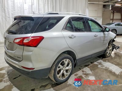 Trzecie zdjęcie samochodu z tyłu: 2018 CHEVROLET EQUINOX PREMIER VIN:3GNAXVEV4JL173582 - miniatura