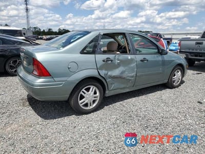 Trzecie zdjęcie samochodu z tyłu: 2003 FORD FOCUS SE VIN:1FAFP34P03W339556 - miniatura