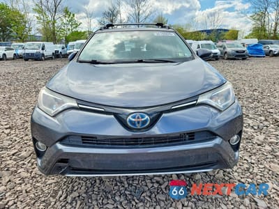 Piąte zdjęcie samochodu w środku: 2018 TOYOTA RAV4 HYBRID XLE VIN:JTMRJREV1JD157706 - miniatura