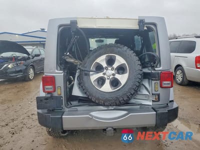 Zdjęcie 6 z 12 samochodu: 2017 JEEP WRANGLER UNLIMITED SAHARA VIN:1C4BJWEG0HL540294 - miniatura