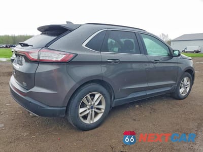 Trzecie zdjęcie samochodu z tyłu: 2015 FORD EDGE SEL VIN:2FMTK4J9XFBB19821 - miniatura