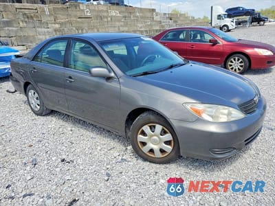 Czwarte zdjęcie samochodu z boku: 2003 TOYOTA CAMRY LE VIN:4T1BE32K13U704985 - miniatura