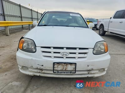 Piąte zdjęcie samochodu w środku: 2003 HYUNDAI ACCENT GL VIN:KMHCG35C03U261988 - miniatura