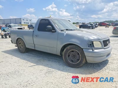 Czwarte zdjęcie samochodu z boku: 1999 FORD F150 VIN:1FTZF1725XNA91427 - miniatura