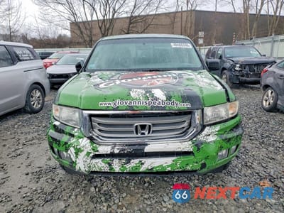Piąte zdjęcie samochodu w środku: 2012 HONDA RIDGELINE RTL VIN:5FPYK1F52CB451580 - miniatura