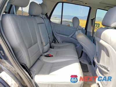 Zdjęcie 11 z 13 samochodu: 2002 MERCEDES-BENZ ML 500 VIN:4JGAB75E92A323547 - miniatura