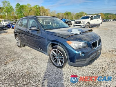 Czwarte zdjęcie samochodu z boku: 2015 BMW X1 SDRIVE28I VIN:WBAVM1C51FVW57017 - miniatura
