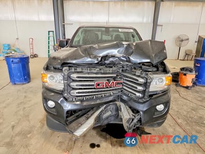 Piąte zdjęcie samochodu w środku: 2016 GMC CANYON SLE VIN:1GTG6CE37G1115216 - miniatura