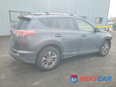 Trzecie zdjęcie samochodu z tyłu: 2016 TOYOTA RAV4 HYBRID XLE VIN:JTMRJREV5GD033169 - miniatura
