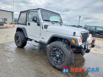 Czwarte zdjęcie samochodu z boku: 2004 JEEP WRANGLER / TJ SE VIN:1J4FA29194P724713 - miniatura