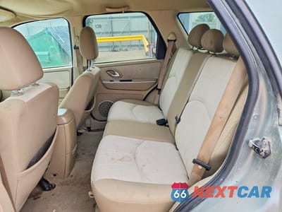 Zdjęcie 10 z 11 samochodu: 2006 MERCURY MARINER VIN:4M2YU56Z16DJ03899 - miniatura