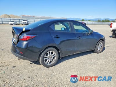 Trzecie zdjęcie samochodu z tyłu: 2017 TOYOTA YARIS IA BASE VIN:3MYDLBYV9HY185253 - miniatura