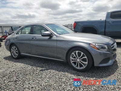 Czwarte zdjęcie samochodu z boku: 2017 MERCEDES-BENZ C 300 VIN:55SWF4JB7HU202975 - miniatura