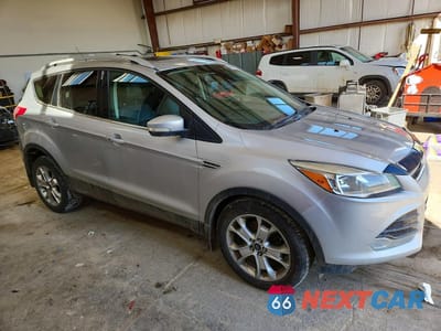 Czwarte zdjęcie samochodu z boku: 2014 FORD ESCAPE TITANIUM VIN:1FMCU9J95EUD26844 - miniatura