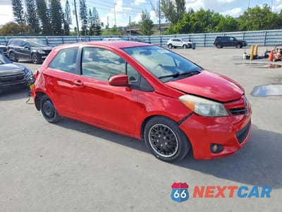 Czwarte zdjęcie samochodu z boku: 2014 TOYOTA YARIS 3-DOOR L VIN:JTDJTUD37ED578779 - miniatura
