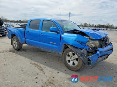 Czwarte zdjęcie samochodu z boku: 2011 TOYOTA TACOMA V6 VIN:3TMMU4FN2BM034571 - miniatura