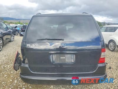Zdjęcie 6 z 13 samochodu: 2000 MERCEDES-BENZ ML 320 VIN:4JGAB54E2YA165891 - miniatura
