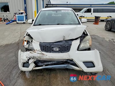 Piąte zdjęcie samochodu w środku: 2011 KIA RIO LX VIN:KNADH4A33B6949467 - miniatura