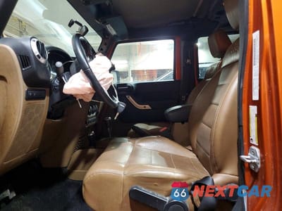 Zdjęcie 7 z 13 samochodu: 2011 JEEP WRANGLER UNLIMITED RUBICON VIN:1J4BA6H1XBL520174 - miniatura