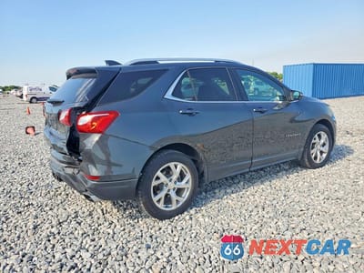 Trzecie zdjęcie samochodu z tyłu: 2018 CHEVROLET EQUINOX LT VIN:3GNAXKEX9JS506896 - miniatura