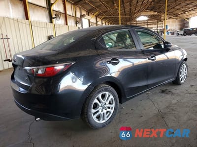 Trzecie zdjęcie samochodu z tyłu: 2017 TOYOTA YARIS IA BASE VIN:3MYDLBYVXHY174889 - miniatura
