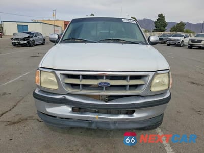 Piąte zdjęcie samochodu w środku: 1998 FORD F150 VIN:1FTZX17W5WNC41972 - miniatura