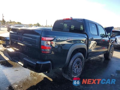 Trzecie zdjęcie samochodu z tyłu: 2026 NISSAN FRONTIER PRO-4X VIN:1N6ED1EK9TN612616 - miniatura