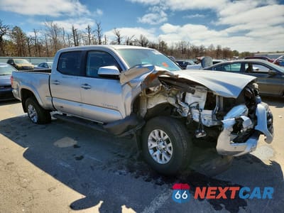 Czwarte zdjęcie samochodu z boku: 2019 TOYOTA TACOMA SR5 V6 VIN:3TMDZ5BN5KM055539 - miniatura