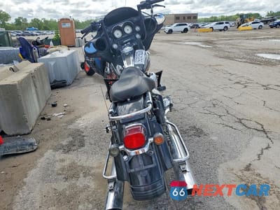 Czwarte zdjęcie samochodu z boku: 2006 HARLEY DAVIDSON FLHXI VIN:1HD1KBW156Y621219 - miniatura