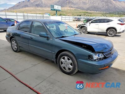 Czwarte zdjęcie samochodu z boku: 1997 HONDA ACCORD EX VIN:1HGCE6671VA016510 - miniatura