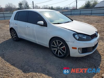 Czwarte zdjęcie samochodu z boku: 2014 VOLKSWAGEN GTI VIN:WVWHD7AJXEW002902 - miniatura