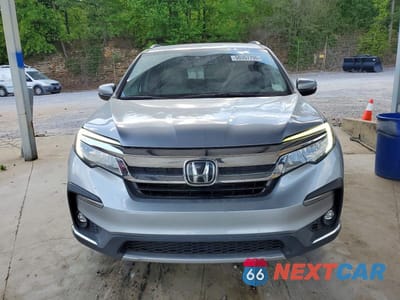 Piąte zdjęcie samochodu w środku: 2020 HONDA PILOT TOURING VIN:5FNYF5H64LB012746 - miniatura