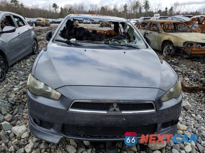 Piąte zdjęcie samochodu w środku: 2010 MITSUBISHI LANCER ES VIN:JA32U2FU4AU003253 - miniatura