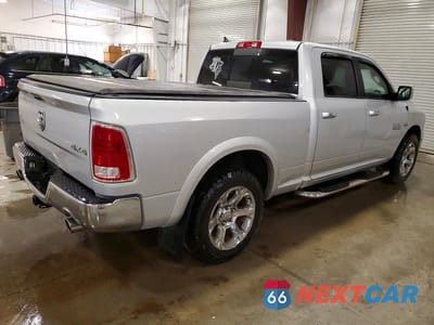 Trzecie zdjęcie samochodu z tyłu: 2014 RAM 1500 LARAMIE VIN:1C6RR7VT2ES406437 - miniatura