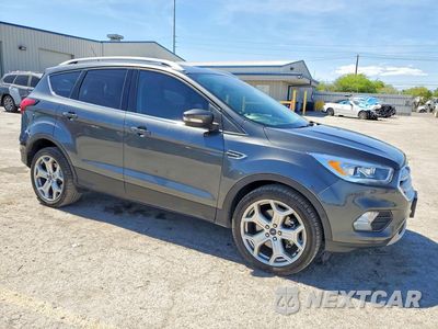 Czwarte zdjęcie samochodu z boku: 2019 FORD ESCAPE TITANIUM VIN:1FMCU0J95KUB05641 - miniatura
