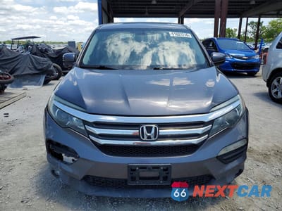 Piąte zdjęcie samochodu w środku: 2017 HONDA PILOT EXLN VIN:5FNYF5H71HB010419 - miniatura