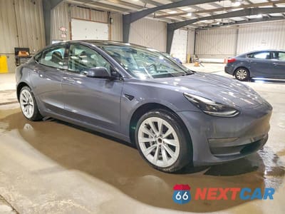 Czwarte zdjęcie samochodu z boku: 2023 TESLA MODEL 3 VIN:5YJ3E1EA9PF449176 - miniatura