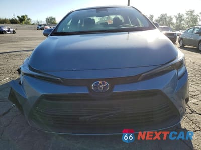 Piąte zdjęcie samochodu w środku: 2025 TOYOTA COROLLA HYBRID LE VIN:JTDBCMFE5S3086062 - miniatura