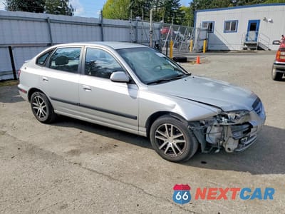 Czwarte zdjęcie samochodu z boku: 2005 HYUNDAI ELANTRA GLS VIN:KMHDN56D95U174932 - miniatura