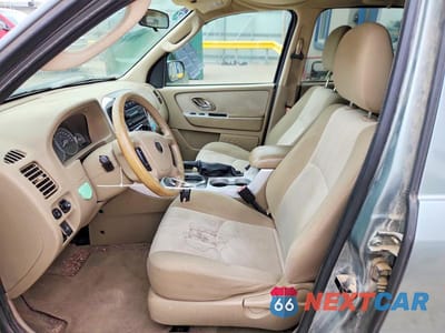 Zdjęcie 7 z 11 samochodu: 2006 MERCURY MARINER VIN:4M2YU56Z16DJ03899 - miniatura