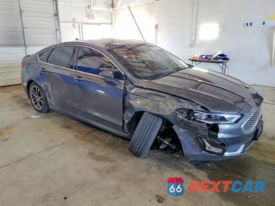 Czwarte zdjęcie samochodu z boku: 2020 FORD FUSION TITANIUM VIN:3FA6P0RU6LR182096 - miniatura