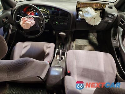 Zdjęcie 8 z 11 samochodu: 1995 TOYOTA CAMRY LE VIN:JT2SK12EXS0312579 - miniatura