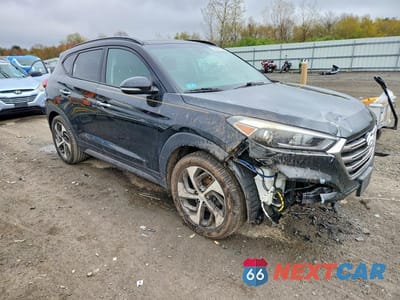 Czwarte zdjęcie samochodu z boku: 2016 HYUNDAI TUCSON LIMITED VIN:KM8J3CA22GU205167 - miniatura