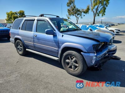 Czwarte zdjęcie samochodu z boku: 2001 NISSAN PATHFINDER SE VIN:JN8DR07X61W503156 - miniatura