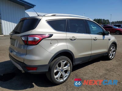 Trzecie zdjęcie samochodu z tyłu: 2017 FORD ESCAPE TITANIUM VIN:1FMCU9JD4HUD99356 - miniatura