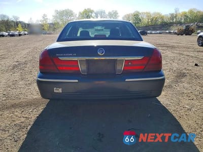 Zdjęcie 6 z 12 samochodu: 2003 MERCURY GRAND MARQUIS GS VIN:2MEFM74W03X627226 - miniatura